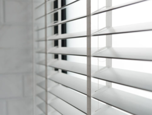 Close-up open venetian blinds. lighting range control sunlight coming from a window. decoration interior. Modern jalousie.